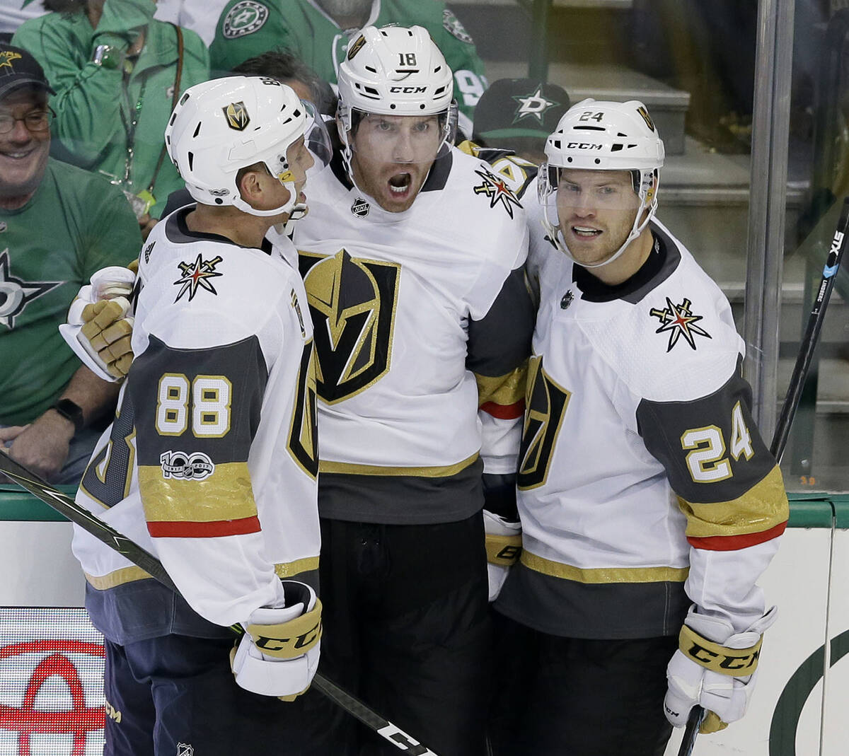 In this Friday, Oct. 6, 2017, file photo, Vegas Golden Knights left wing James Neal, center, ce ...
