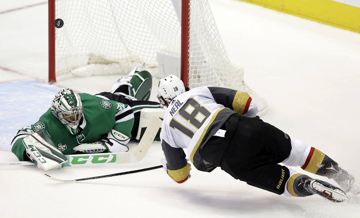 In this Friday, Oct. 6, 2017, file photo, Vegas Golden Knights left wing James Neal (18) scores ...