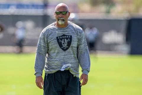 Raiders assistant coach Rich Bisaccia walks on the field during team practice at the Raiders He ...