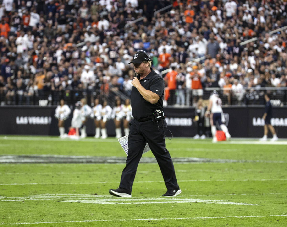 Raiders head coach Jon Gruden walks off the field during the second half of an NFL football gam ...