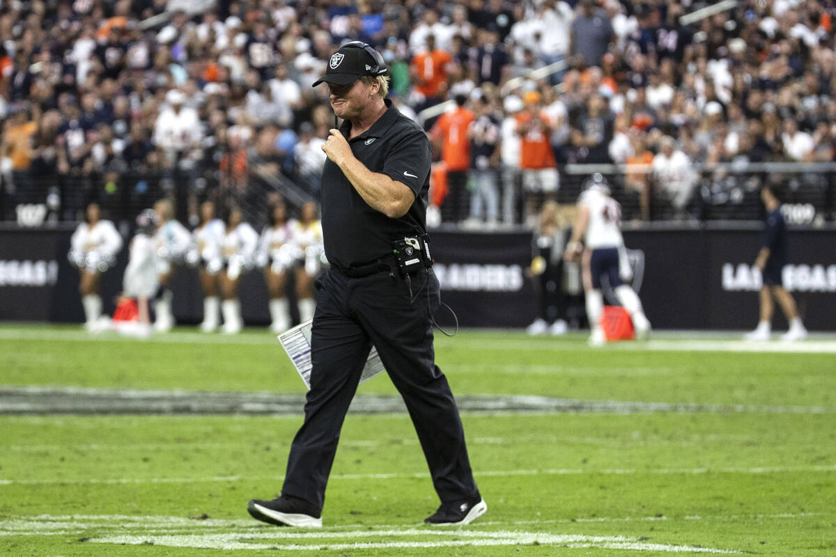 Raiders head coach Jon Gruden walks off the field during the second half of an NFL football gam ...