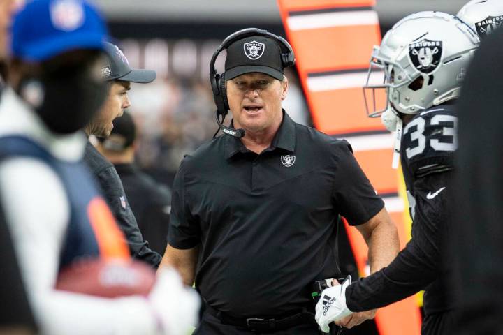 Raiders head coach Jon Gruden walks on the side line during the first half of an NFL football g ...
