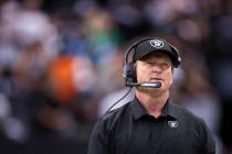 Jon Gruden walks the sideline during an NFL football game against the Chicago Bears. (Benjamin ...