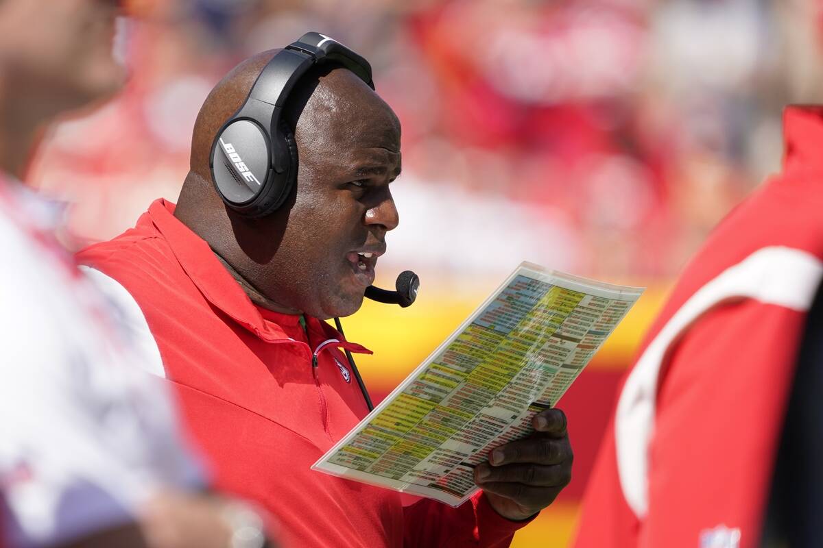 Kansas City Chiefs offensive coordinator Eric Bieniemy watches during the first half of an NFL ...