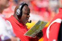 Kansas City Chiefs offensive coordinator Eric Bieniemy watches during the first half of an NFL ...