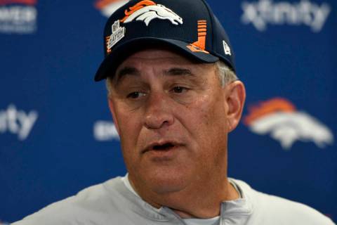 Denver Broncos head coach Vic Fangio meets with reporters following an NFL football game agains ...