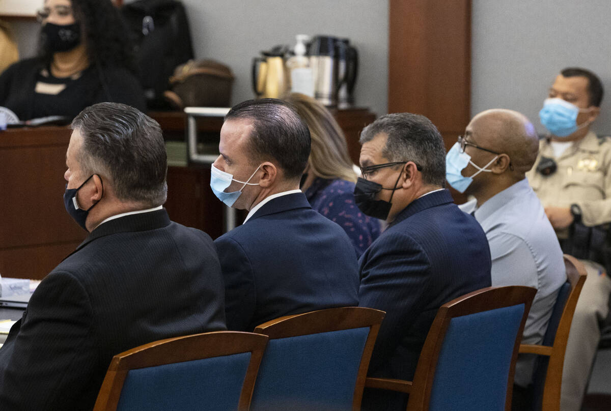 Public defender Clark Patrick, left, representing Michael Rusk, 28, and Christopher Oram, cente ...