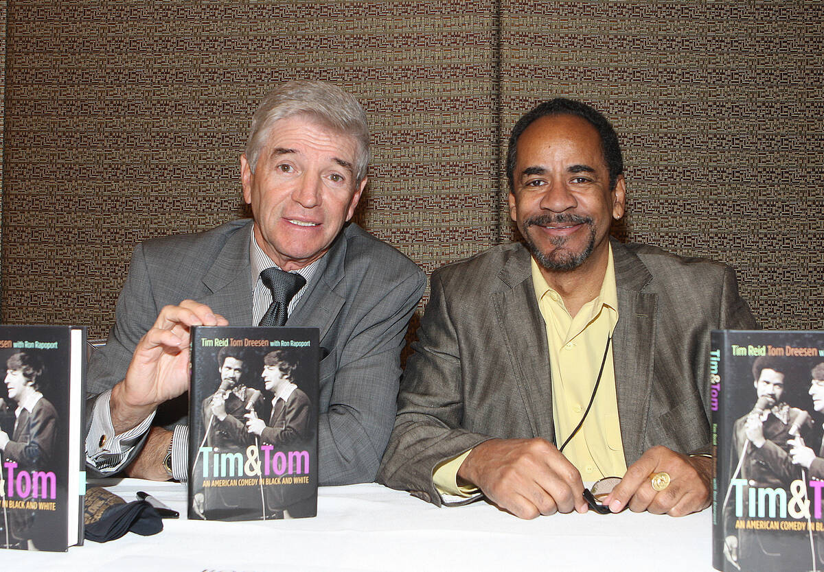 Tom Dreesen and Tim Reid attend Mike Ditka's Gridiron Greats Autograph Extravaganza event at th ...