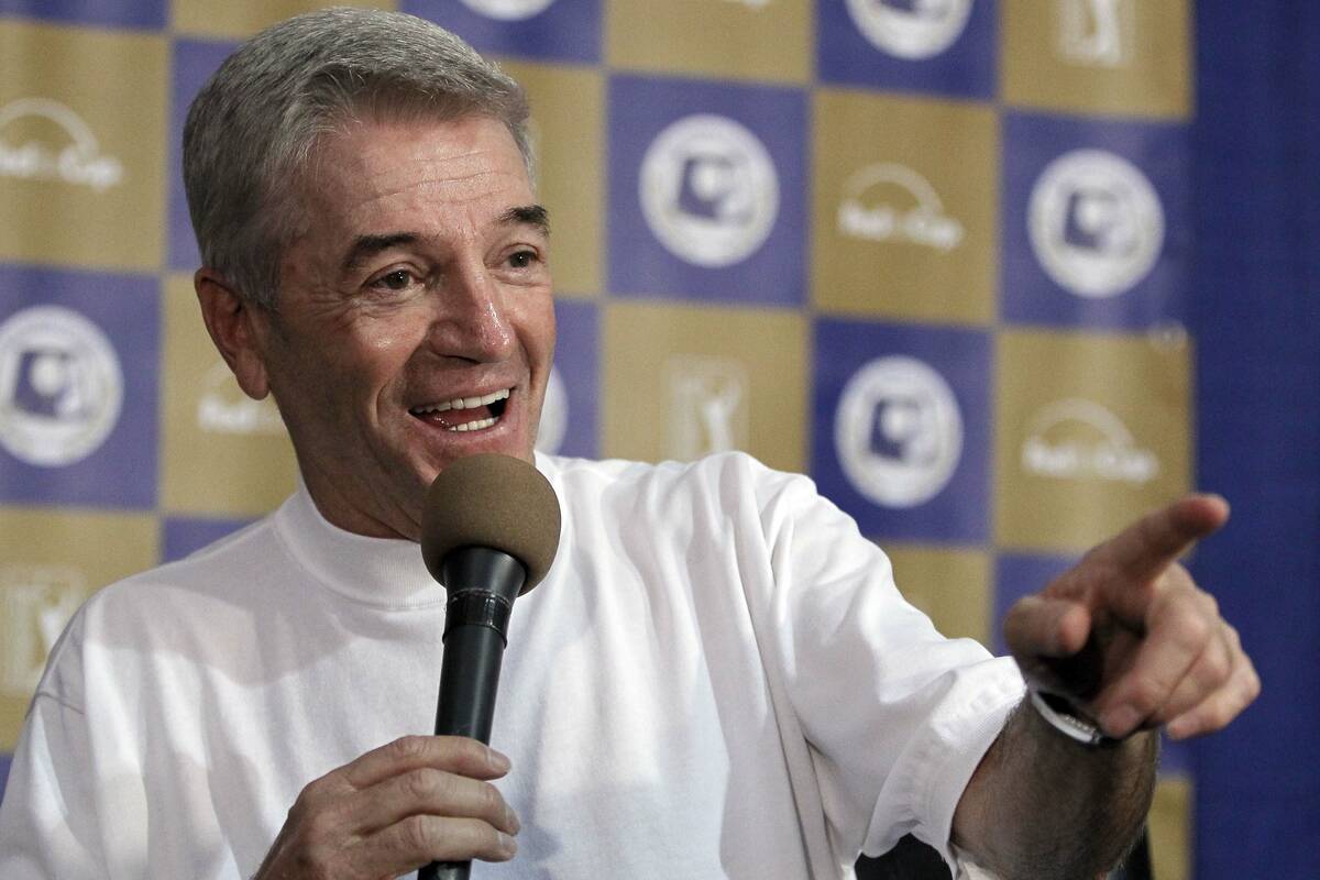 Comedian Tom Dreesen talks to the media during a news conference about the Bob Hope Classic PGA ...