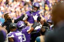 Minnesota Vikings kicker Greg Joseph (1) celebrates with teammates after kicking a 54-yard fiel ...