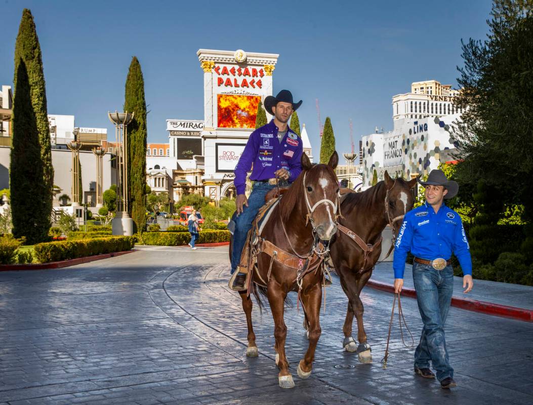 Cowboys Shane Hanchey, left, and Sage Kimzey make the rounds at Caesars Palace to promote the u ...