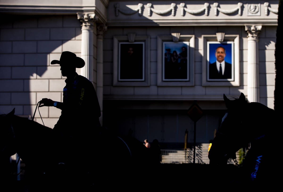 Cowboys Shane Hanchey, left, makes the rounds at Caesars Palace to promote the upcoming Nationa ...
