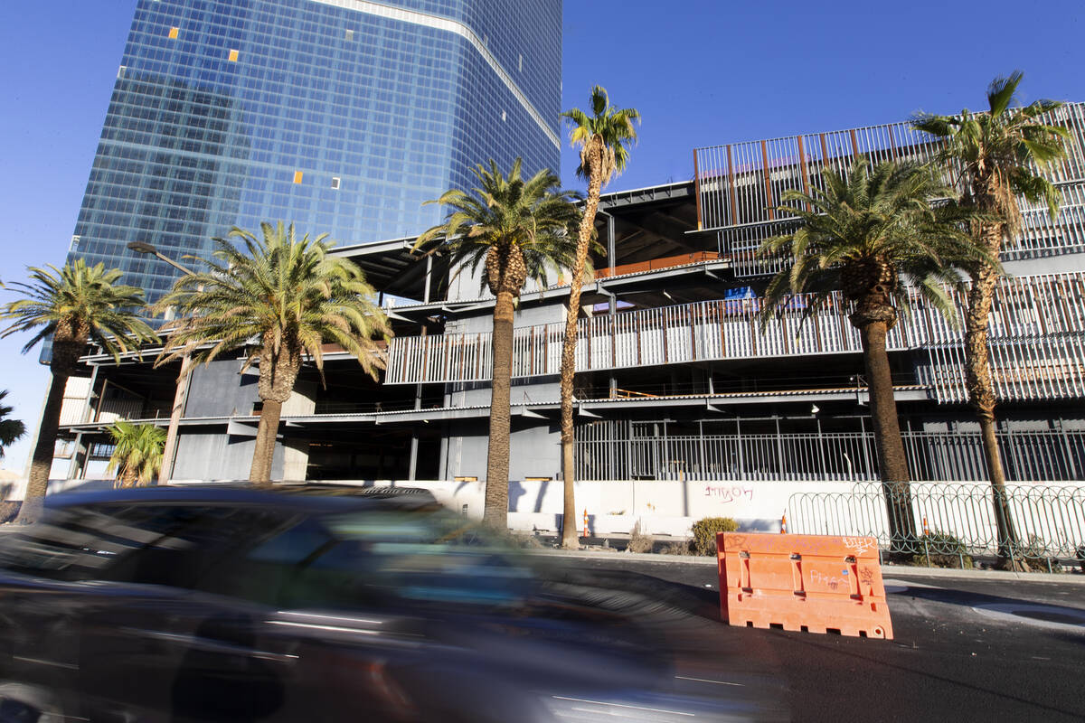 Traffic passes the unfinished former Fontainebleau building on Thursday, Oct. 14, 2021, on the ...