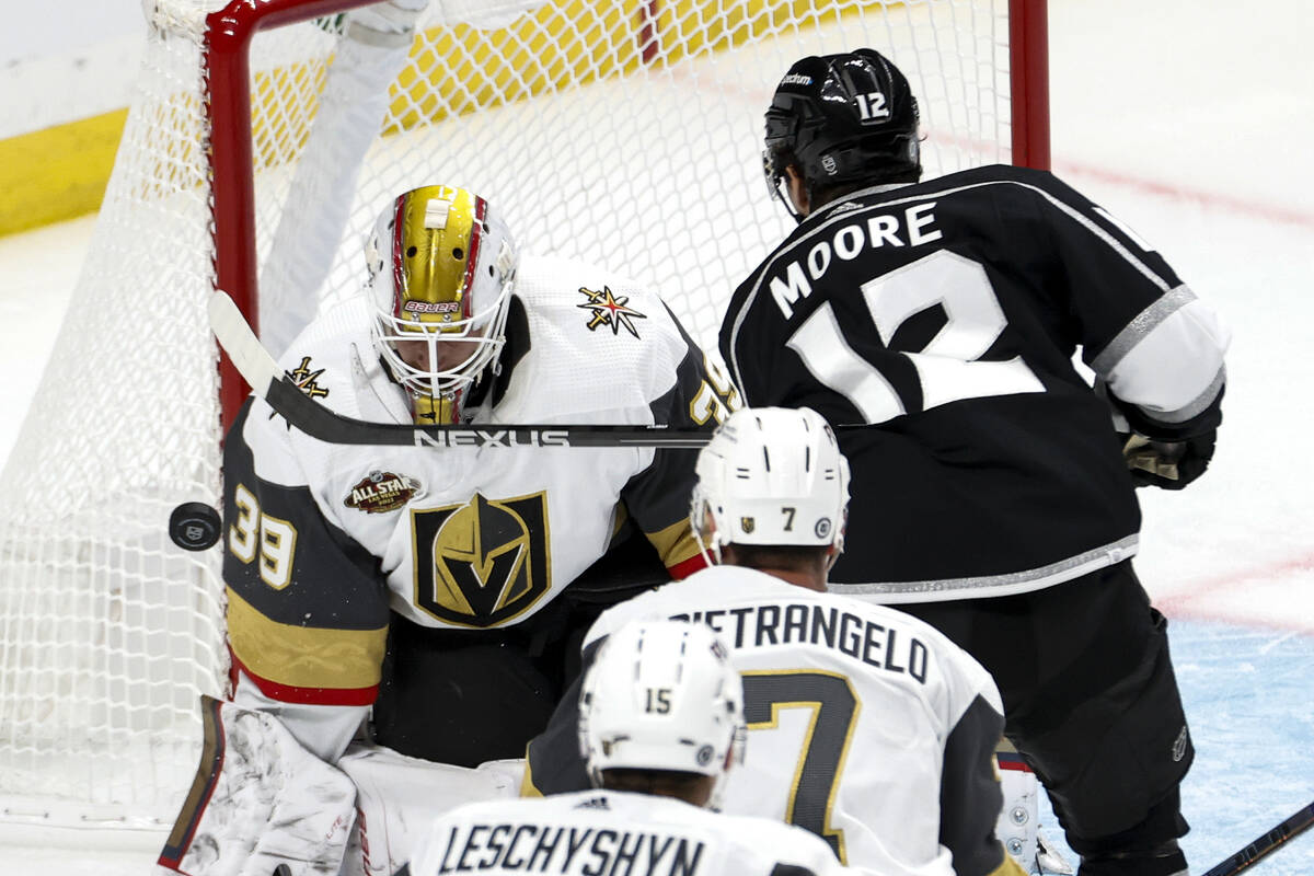 Vegas Golden Knights goalie Laurent Brossoit (39) blocks a shot by Los Angeles Kings forward Tr ...