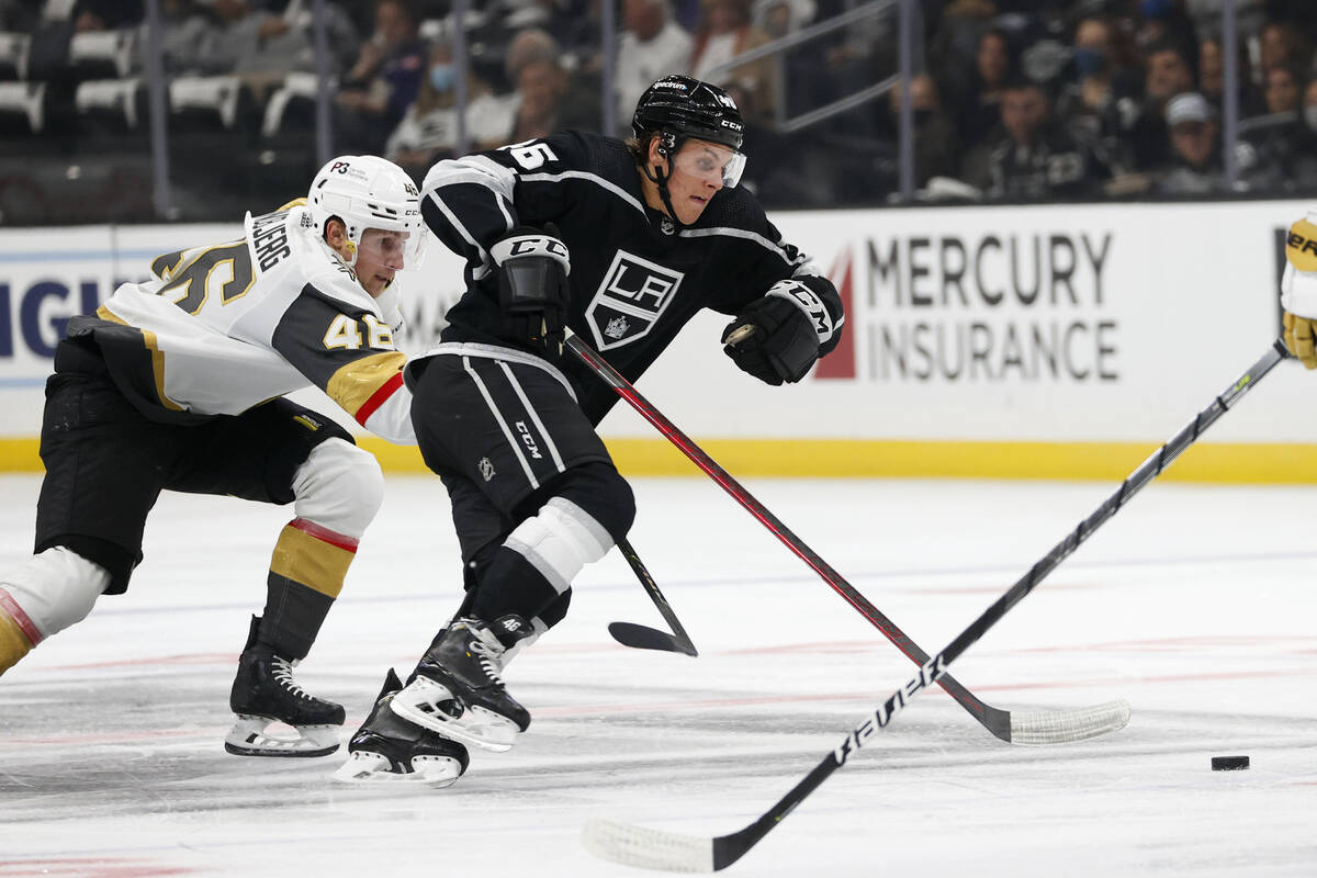 Vegas Golden Knights forward Jonas Rondbjerg, left, and Los Angeles Kings forward Blake Lizotte ...