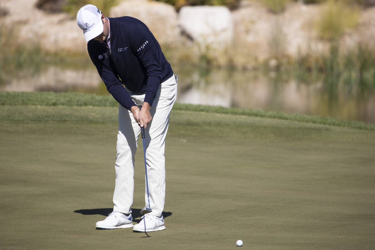 Hudson Swafford putts the ball on the 11th green during the first round of the CJ Cup golf tour ...