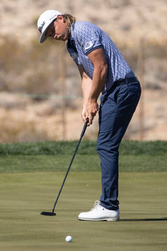Cameron Smith putts the ball in the 18th green during the first round of the CJ Cup golf tourna ...