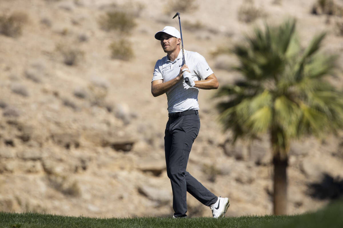 Aaron Wise hits the ball from the 17th fairway during the first round of the CJ Cup golf tourna ...