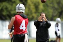 Oakland Raiders quarterback Derek Carr (4) throws the football to offensive coordinator Greg Ol ...