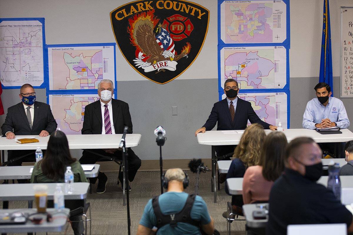 Nevada Division of Emergency Management Chief David Fogerson, from left, Nevada Governor Steve ...