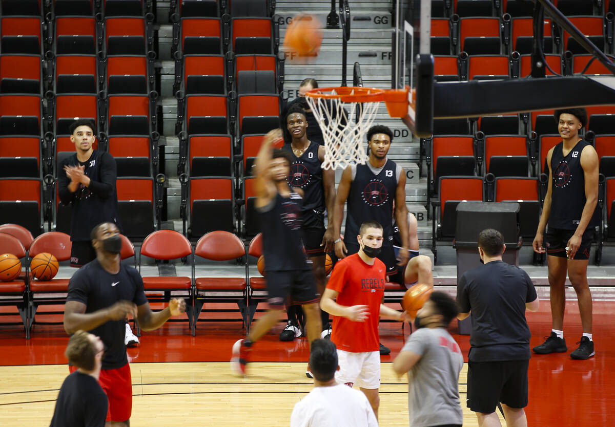 UNLV players participate in drills during an open basketball practice and fundraiser for former ...