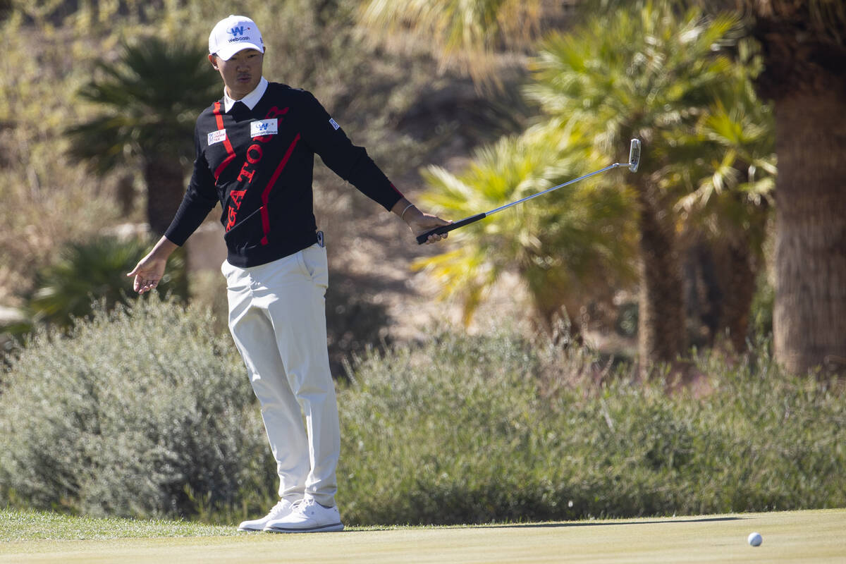 Seonghyeon Kim hits reacts after missing a putt in the 14th hole during the second round of the ...