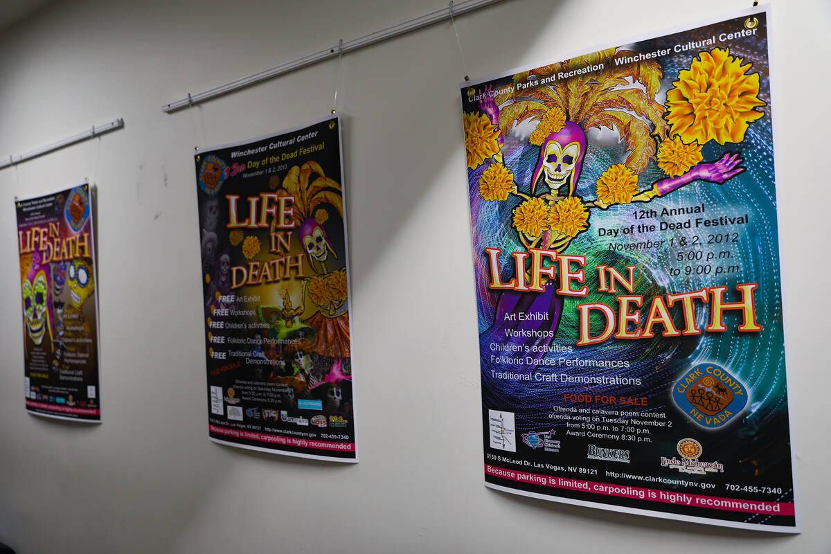 Posters for past Life in Death Festivals line the walls at the Winchester Cultural Center in La ...