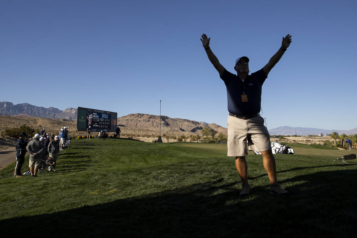 Fans watch game play in the 18th green during the second round of the CJ Cup golf tournament at ...