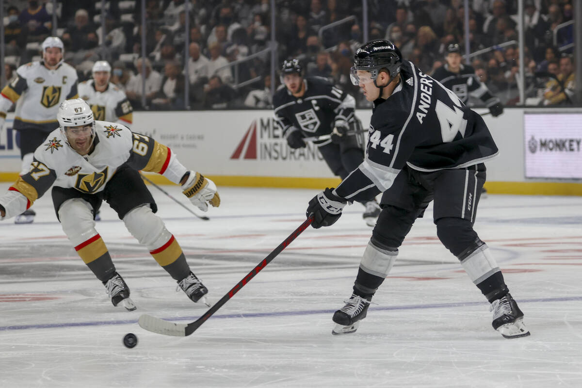 Los Angeles Kings defenseman Mikey Anderson (44) passes the puck against Vegas Golden Knights f ...