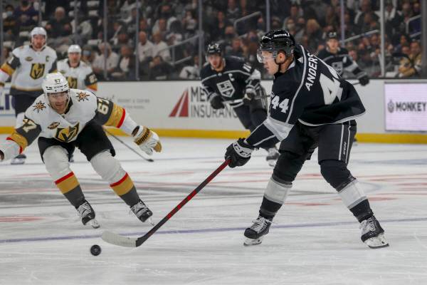 Los Angeles Kings defenseman Mikey Anderson (44) passes the puck against Vegas Golden Knights f ...