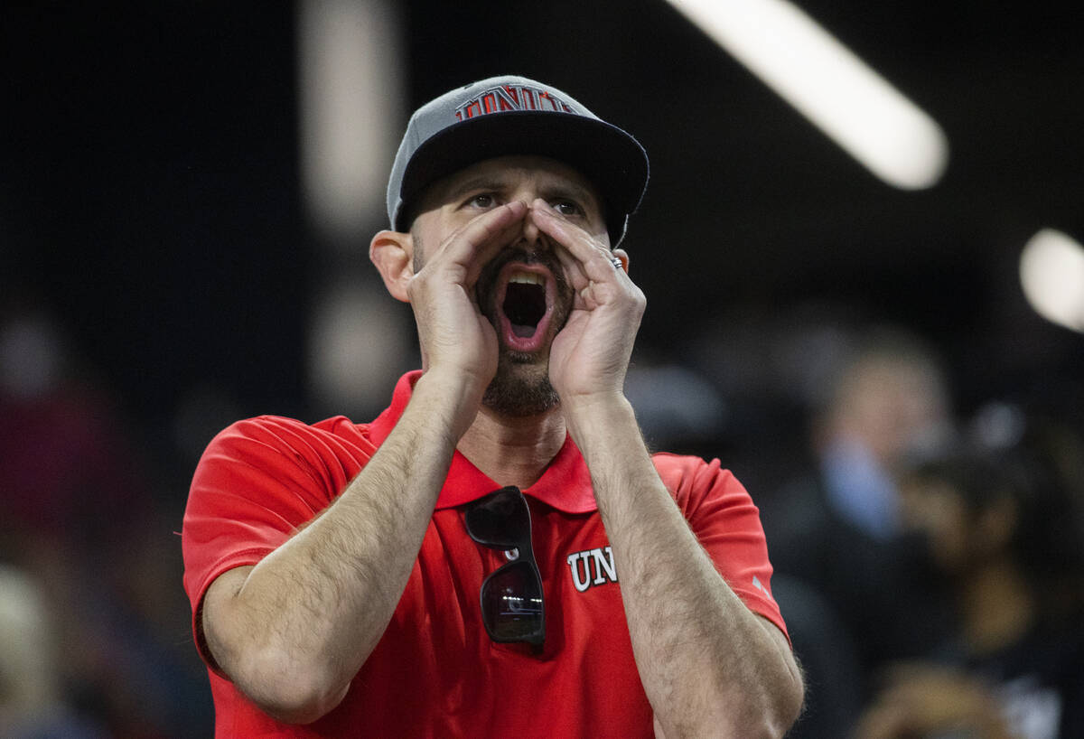 UNLV fans are despondent after losing to Utah State at the end of an NCAA college football game ...