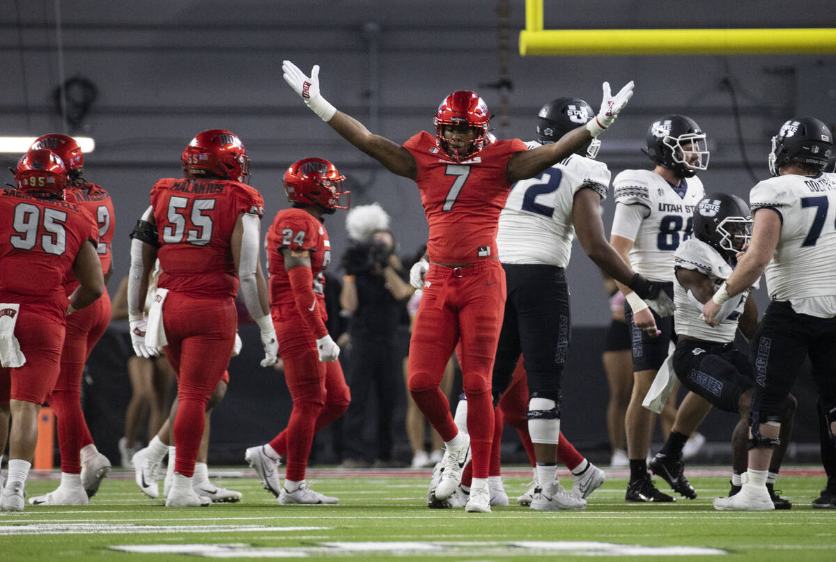 UNLV Rebels defensive lineman Adam Plant Jr. (7) celebrates a big defensive play in the second ...