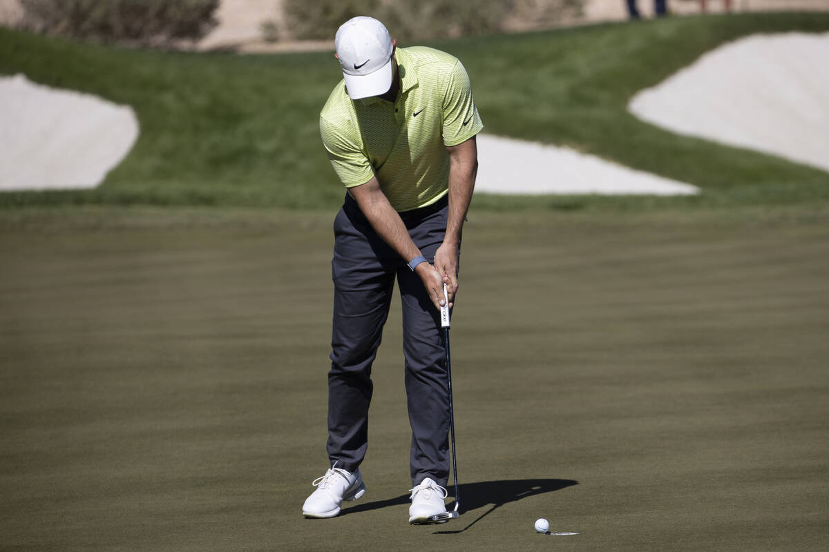 Rory McIlroy putts the ball on the 13th hole during the third round of the CJ Cup golf tourname ...