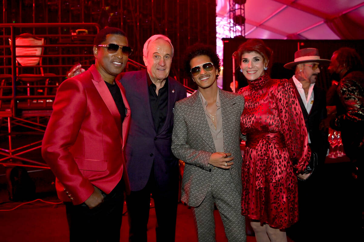 LAS VEGAS, NEVADA - OCTOBER 16: Kenny "Babyface" Edmonds, Larry Ruvo, Bruno Mars and Camille Ru ...