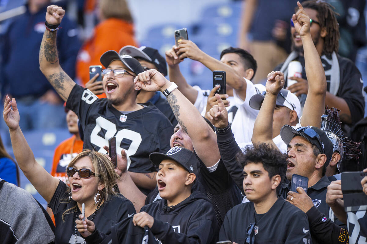 Raiders' fans cheer as the win is near versus the Denver Broncos during the second half of an N ...