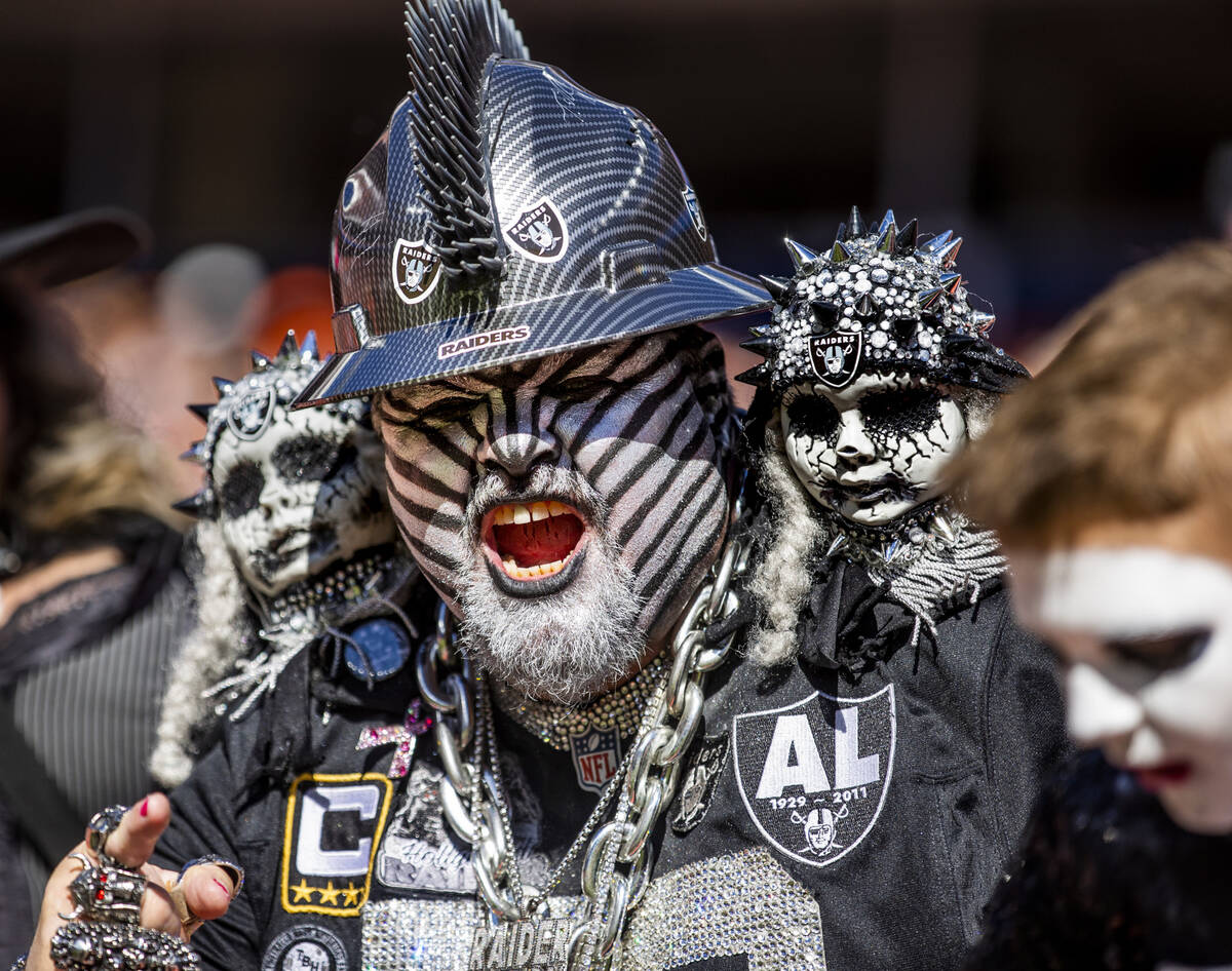 A RaidersÕ fan yells for the team versus the Denver Broncos during the first half of an NF ...