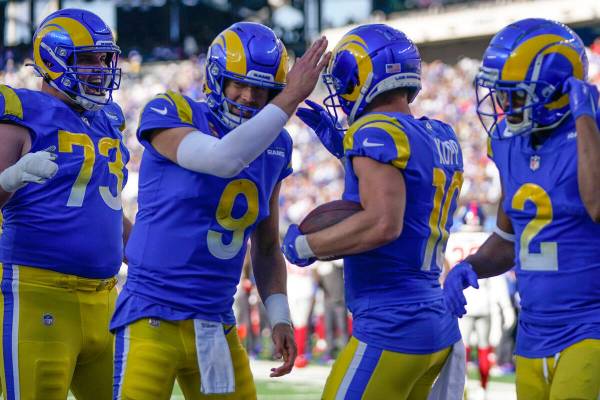 Los Angeles Rams' Cooper Kupp, second from right, celebrates his touchdown with quarterback Mat ...