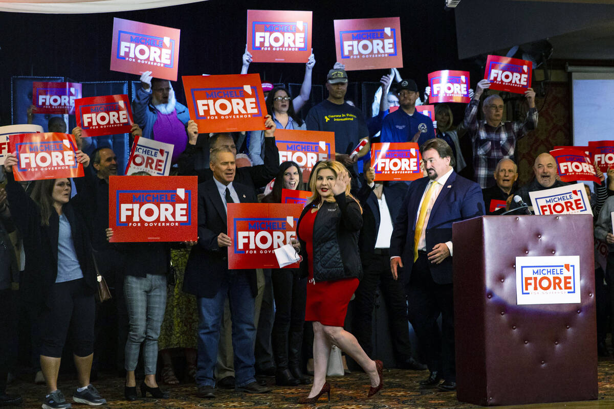 Supporters of Las Vegas Councilwoman Michele Fiore cheer as she announces her gubernatorial cam ...