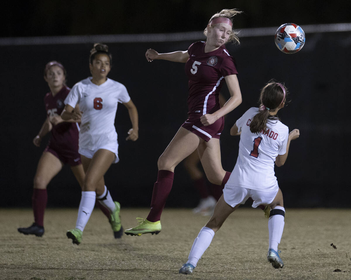 Desert Oasis' Skylar Callaway (5) heads the shot  against a Coronado defender successful  the 2nd  fractional  ...