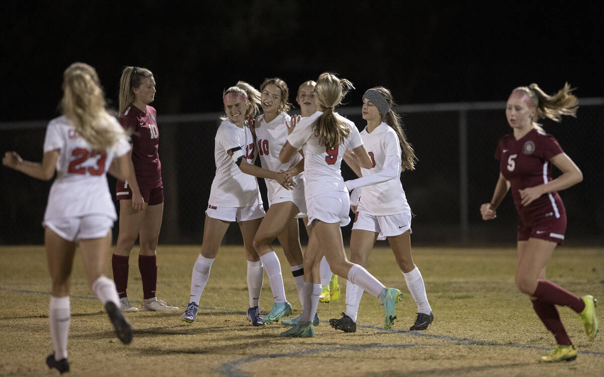 Coronado's Xayla Black (10) celebrates a extremity   with teammates successful  the archetypal  fractional  during a girls h ...