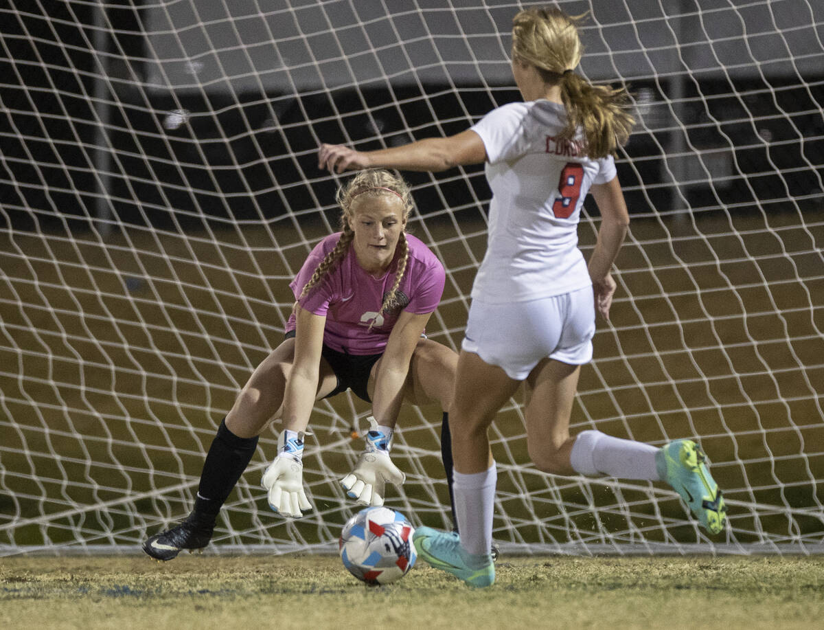 Desert Oasis' Bryanna Perry (2) makes a save against Coronado's Molly Russell (9) in the first ...