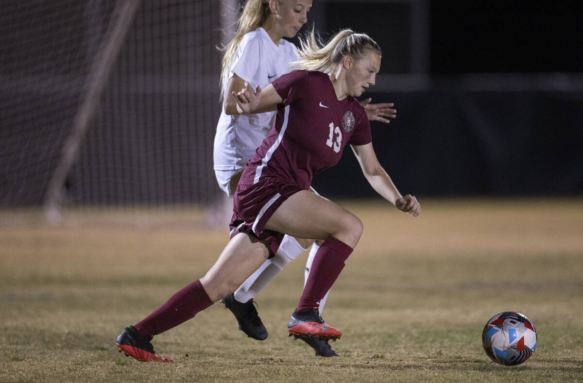 Desert Oasis' Sydney Bastin (13) sprints past   Coronado's Molly Russell (9) successful  the archetypal  fractional  du ...