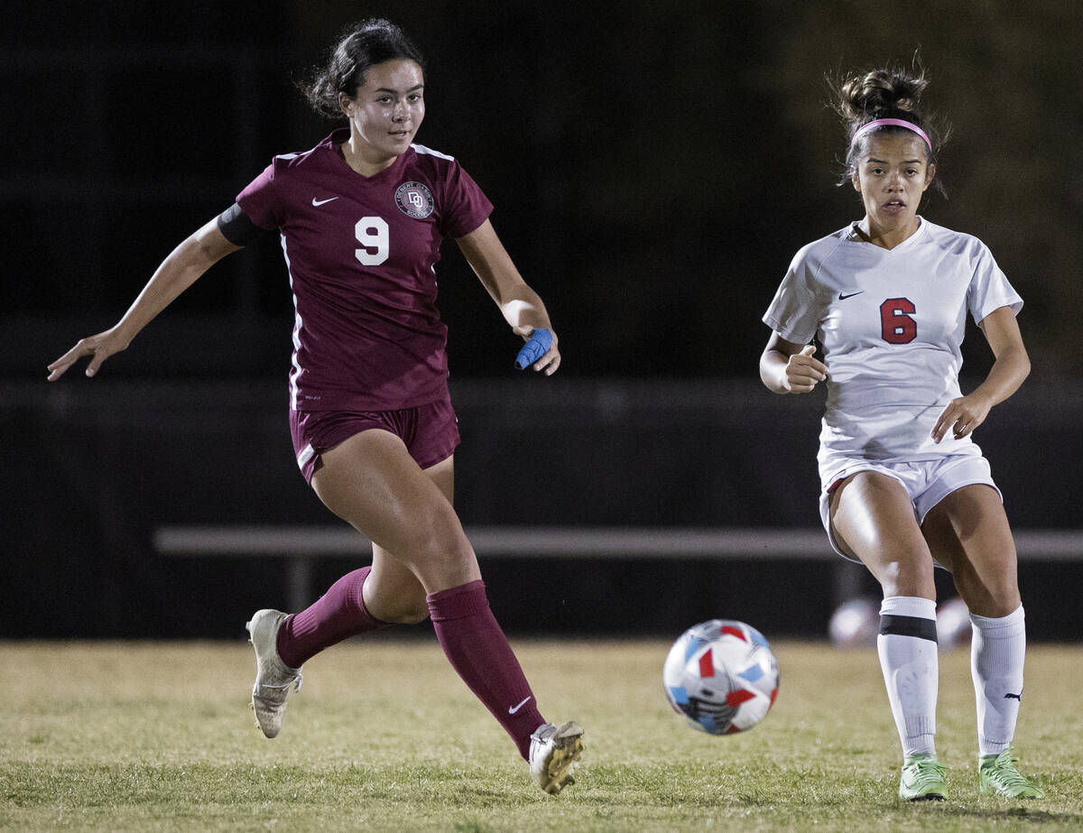 Desert Oasis' Emma D’Angelo (9) pushes the shot  up   tract  past   a Coronado defender successful  the ...