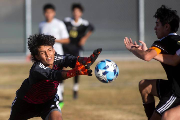 Green Valley's Edwin Lagunas-Monroy (0) misses the save on a goal shot by Sunrise Mountain's Kr ...