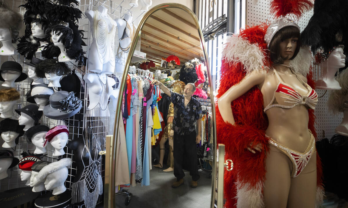 American Costumes owner Martin Howard, middle, at his store in Las Vegas on Tuesday, Oct. 19, 2 ...