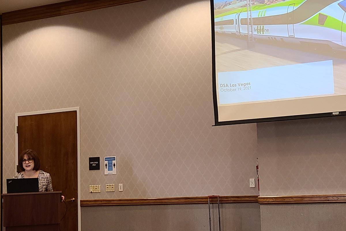 Greta Seidman, director of public affairs for Brightline West, addresses the Destination Servic ...