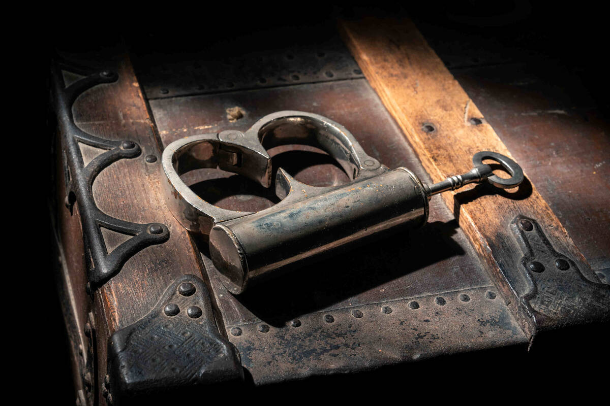 A set of handcuffs that belonged to magician Harry Houdini, who was known as "The King of ...