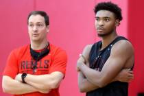 UNLV coach Kevin Kruger with guard Bryce Hamilton after practice at the Mendenhall Center in La ...