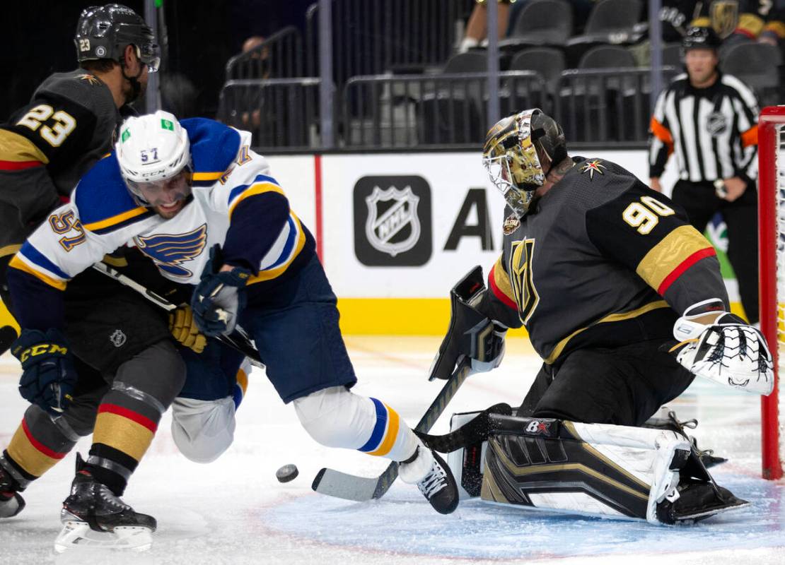 Golden Knights goaltender Robin Lehner (90) saves a goal shot by Blues left wing David Perron ( ...