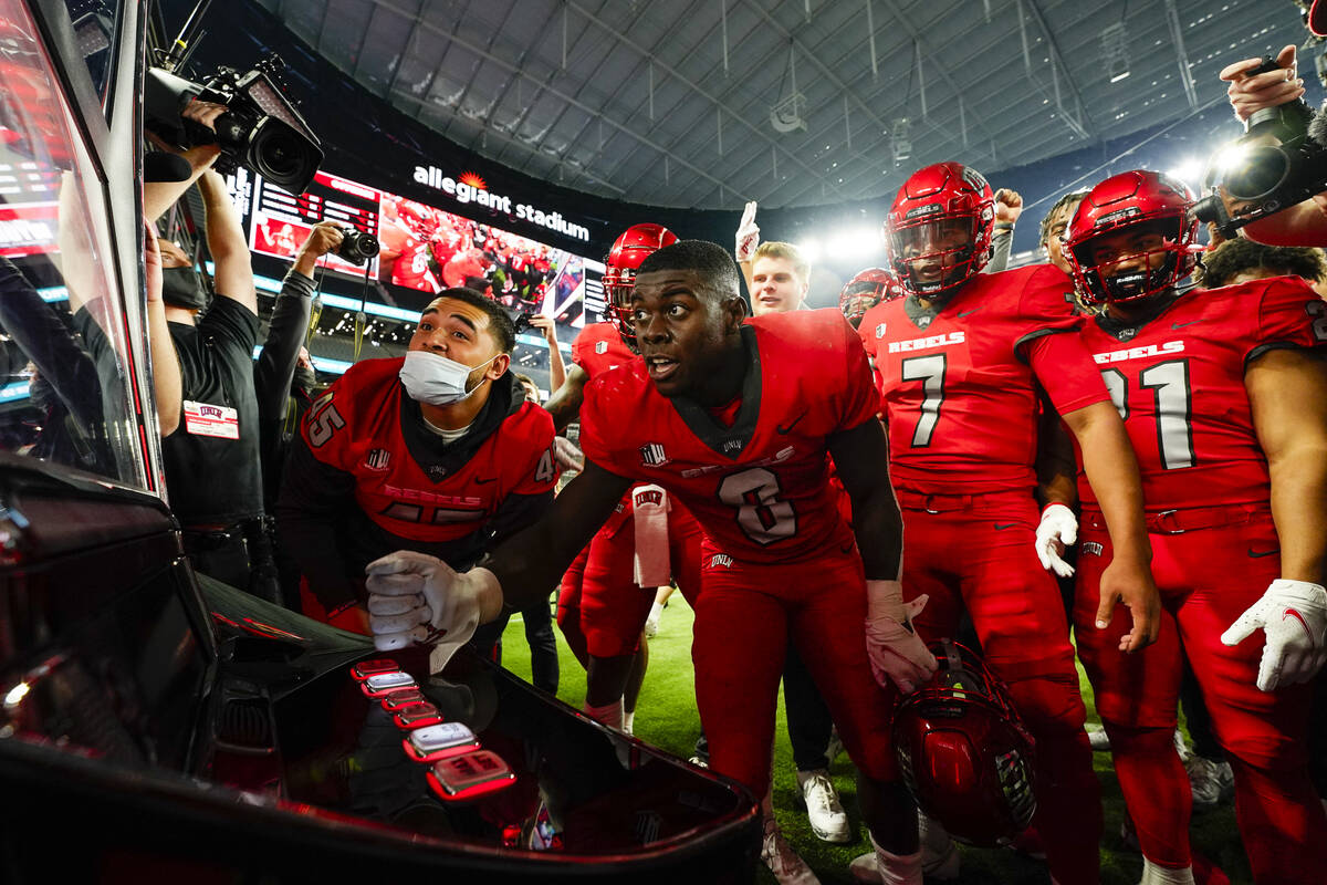 UNLV brought out a slot machine in Saturday's 28-24 loss to Utah State at Allegiant Stadium. Pl ...